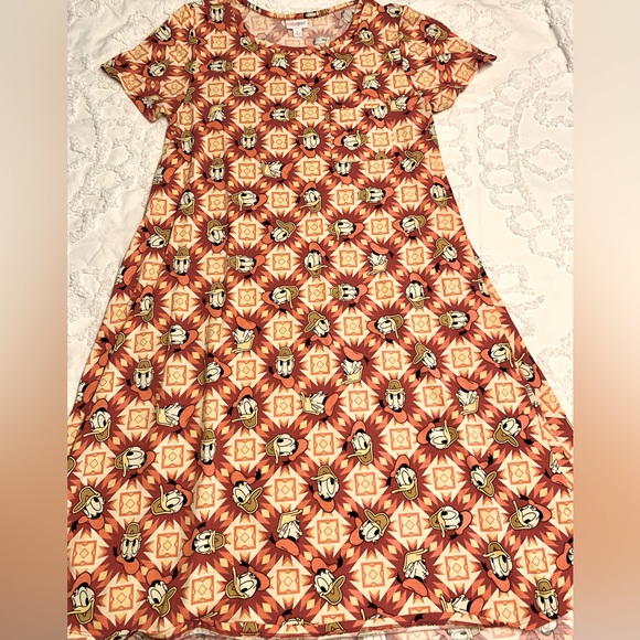 LuLaRoe Dresses & Skirts - LulaRoe Donald Duck Carly dress